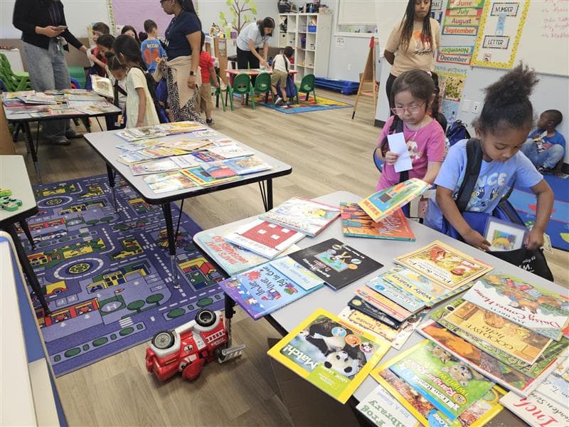 Children at a book fair event at Bright Beginners Academy Bensalem