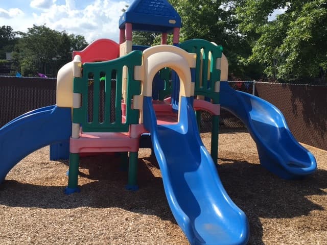 Outdoor playground with climbing structures